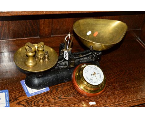 A VICTORIAN CAST IRON AVERY BALANCE SCALES, with a collection of weights and a modern barometer