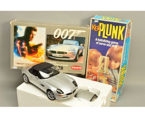 A BOXED KYOSHO 1:12 SCALE DIECAST JAMES BOND B.M.W Z8 SPORTS CAR, No.086018, appears complete with all accessories and hard t