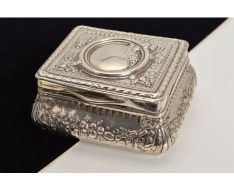 A CONTINENTAL WHITE METAL SNUFF BOX OF BOMBE FORM, repousse decorated with fruits and swags, bears pseudo marks and stamped 8