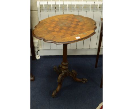 AN EDWARDIAN BURR WALNUT CHESS TABLE, wavy edge on a tulip upright and scrolled tripod legs (s.d. to top)