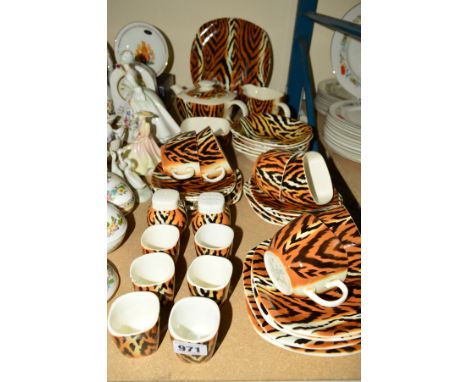 A T.G.GREEN &amp; CO LTD SAFARI PATTERN BREAKFAST SET, comprising six egg cups, six cups, six saucers and six tea plates, fiv