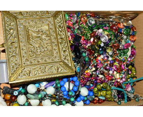 A BOX OF COSTUME JEWELLERY, to include necklaces, brooches, earrings etc, and a hinged decorative embossed metal box, togethe
