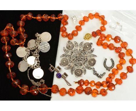 A SMALL SELECTION OF JEWELLERY, to include a Scandinavian abstract pendant set with a circular amethyst cabochon, by N.E. Fro