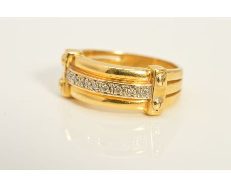 A DIAMOND SET DRESS RING, the three band design claw set with a line of brilliant cut diamonds with screw detail to either en