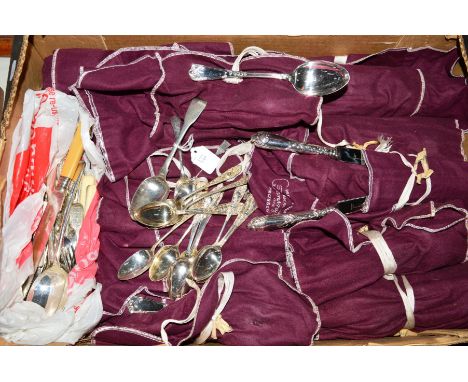 A SILVER PLATED CANTEEN OF CUTLERY, wrapped in divided tarnish protector cloths, together with a silver dessert spoon, silver