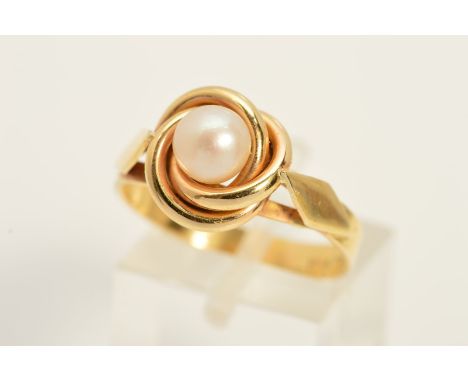 A MODERN CULTURED PEARL DRESS RING, knot head design, ring size Q 1/2, stamped '585', approximate gross weight 3.8 grams