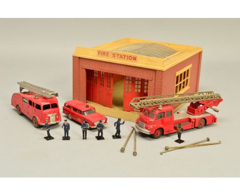 AN UNBOXED BUILT DINKY TOYS FIRE STATION KIT, No.954, missing glazing from one side window, Dinky logos from front and has cr