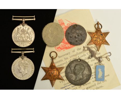 A SELECTION OF MAINLY COINS AND MEDALS, to include the Africa Star and the 1939-1945 star medal, a 1939-1945 Defence Medal an