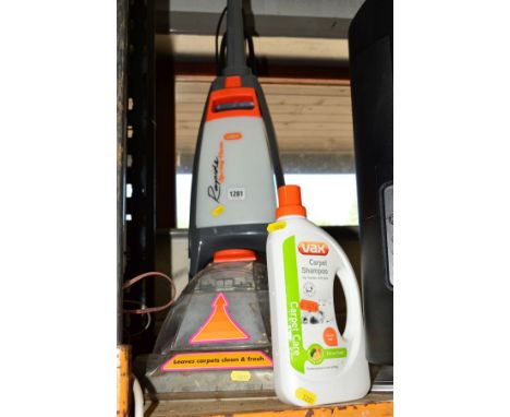 A VAX CARPET CLEANER together with a bottle of Vax carpet shampoo (2)