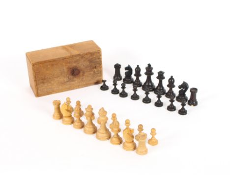 A turned wooden chess set, in pine box