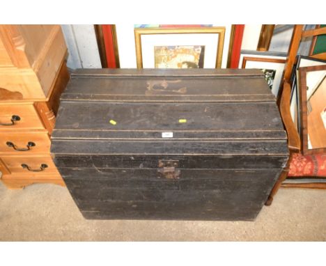 A black painted wooden trunk 