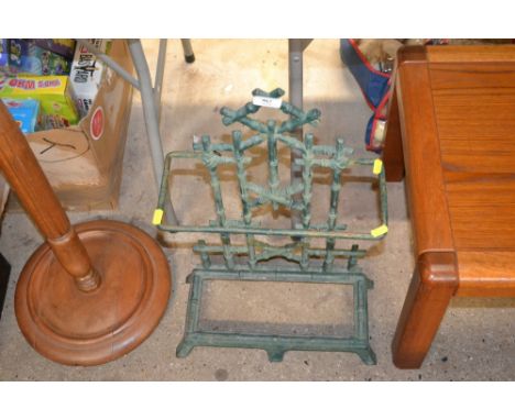 A green painted metal stick stand 