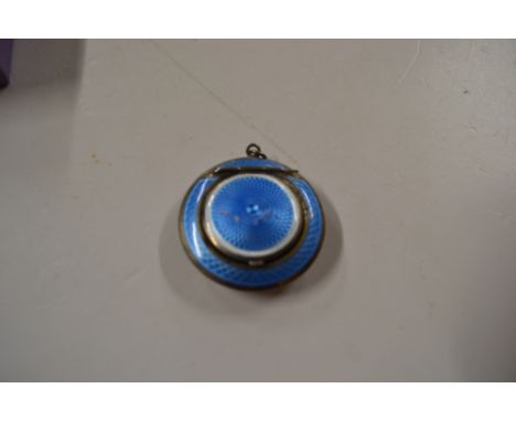 A miniature silver and blue enamel decorated powder compact 