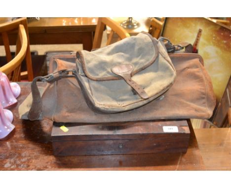 A shooting bag, containing a leather powder flask; together with a Gladstone style bag; and a 19th Century mahogany box 