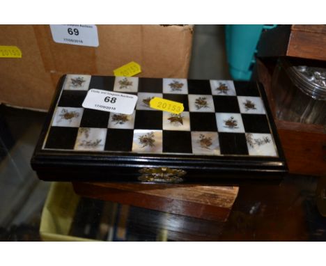 A travelling chess set; and an inlaid folding crib board