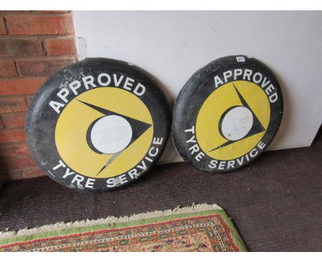 2 Dunlop advertising signs