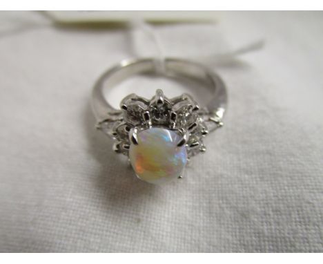 Platinum opal and diamond cluster ring