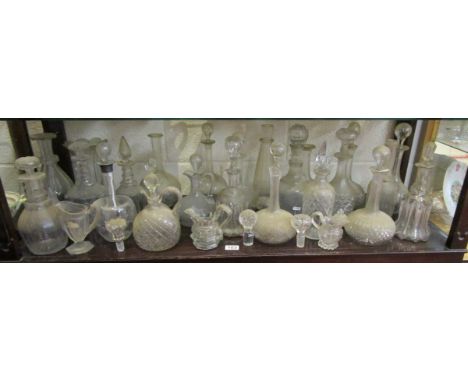 Shelf of glassware to include many decanters