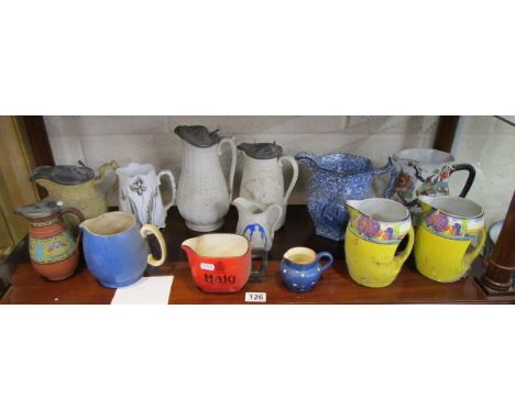 Shelf of various jugs