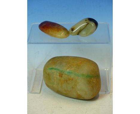 AN ANTIQUE NATURAL FORM JADE BOULDER 12CM WIDE  TOGETHER WITH TWO SMALLER POLISHED JADE EXAMPLES (3)