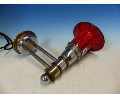 A MID 20th.C. GERMAN WALL LIGHT, THE BLACK STRIPED RED GLASS SHADE CLAMPING INTO CHROME FITTINGS.