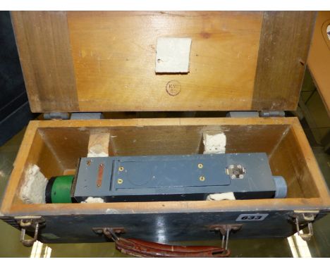 AN AIR MINISTERY WOODEN CASED 12 VOLT G45 CAMERA WITH STANDARD LENS REF. No. 14A/1379, THE CASE.   W 35cms.