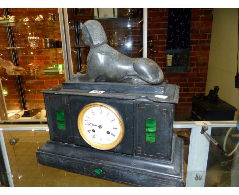 A LATE VICTORIAN SLATE EGYPTIAN REVIVAL MANTEL CLOCK,  A SPHINX ABOVE ENAMEL DIAL WITH FLANKING MALACHITE INSETS.  WORKS MARK