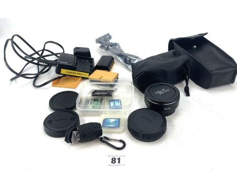 Canon accessories inc. Batteries, charger, lens covers, memory cards etc