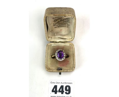 18k gold ring with large purple stone and diamond chips, size O, w: 4.8 gms