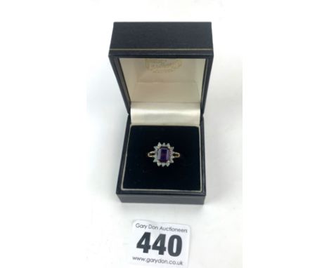 9k gold ring with large purple stone and opals, size O, w: 4.2 gms