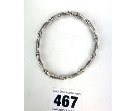 9k white gold twist bangle, w: 5 gms