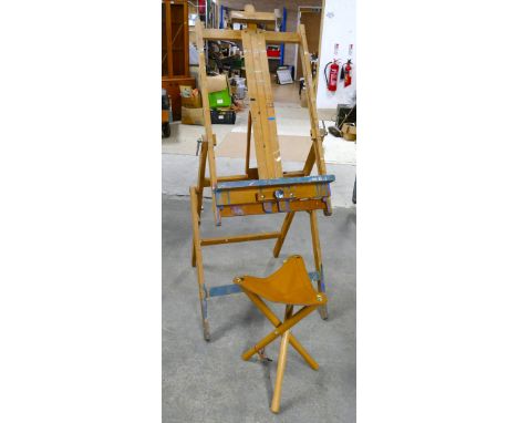 Large Winsor and Newton folding artists easel with an unbranded folding stool.
