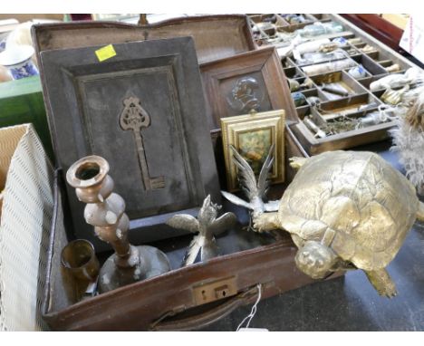 Vintage leather suitcase with key mounted in an oak plaque, gold coloured tortoise figure, metal fighting cocks, copper candl
