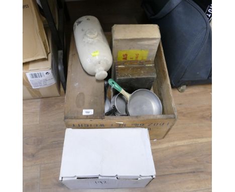 Wooden corned beef crate containing vintage pans, kettles, stoneware hot water bottle, outdoor light, portable boiling ring e