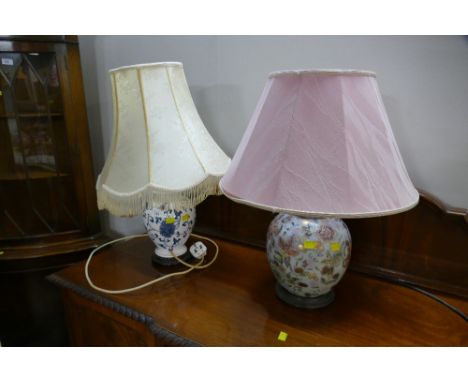 Two ceramic bulbous lamps with shades