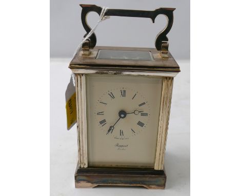 A Rapport of London small metal carriage clock, 15 cm high with key