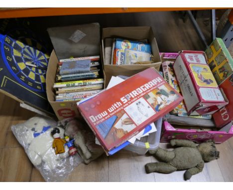 Four boxes of vintage children's board games, annuals, Teddy Bears and a dart board