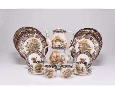 A Royal Worcester Palissy Game Birds coffee and dinner service, including two coffee pots and covers, twelve coffee cups and 