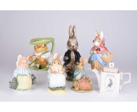 BEATRIX POTTER - Three Border Fine Arts money banks, comprising Mrs Rabbit; Peter Rabbit and Aunt Pettitoes; sold together wi