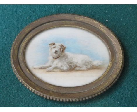 GILT FRAMED OVAL MINIATURE PORTRAIT OF A TERRIER 