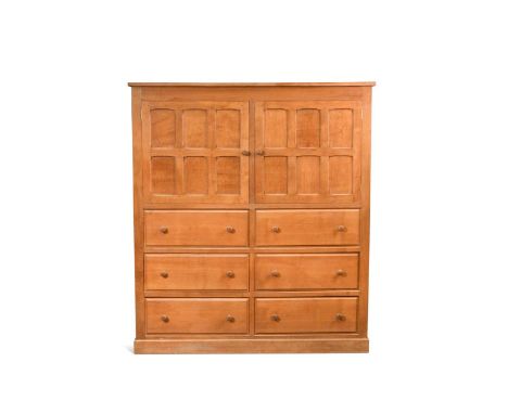 Cat and Mouseman: Lyndon Hammell (Harmby), an oak press cupboard, the rectangular top above a pair of panelled cupboard doors