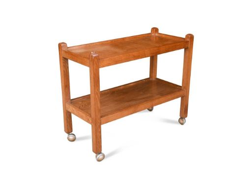 A Robert 'Mouseman' Thompson oak two-tier trolley, the rectangular galleried tiers raised on four square column supports with