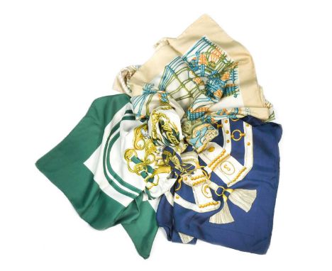 A collection of three Hermès silk scarves, to include: Brides de Gala in forest green, designed by Hugo Grygkar in 1957, 90 x