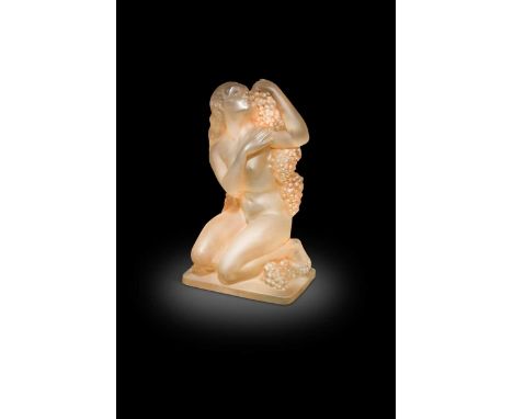 Automne, an R. Lalique frosted glass figurine, designed 1939, press-moulded as a crouching female nude, the embodiment of Aut