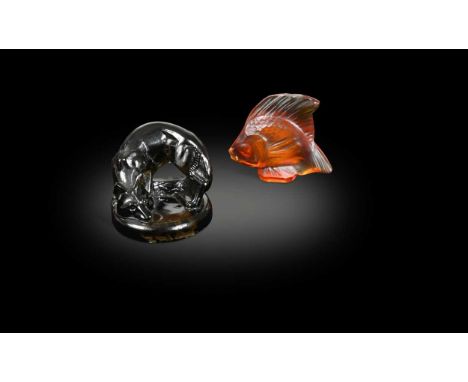 Renard, an R. Lalique topaz glass seal, designed 1926, modelled as a crouching fox on a circular base, etched marks to unders