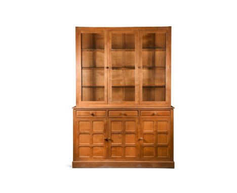Cat and Mouseman: Lyndon Hammell (Harmby), an oak glazed bookcase, the three glazed doors above an adzed rectangular top and 