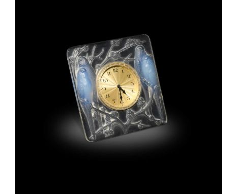 Inseparables, an R. Lalique opalescent and clear glass easel clock, no.765, designed 1926, relief moulded with a design of fo
