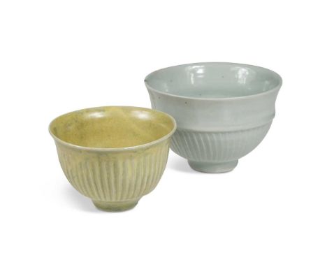 § David Leach OBE (British, 1911-2005), two celadon glazed cut-sided bowls, each with seal marks to undersidethe largest 8 x 