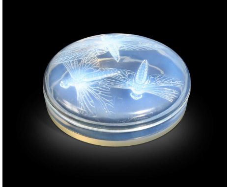 Libellules, an R. Lalique opalescent glass powder box and cover, designed 1921, the circular cover reverse moulded with a des