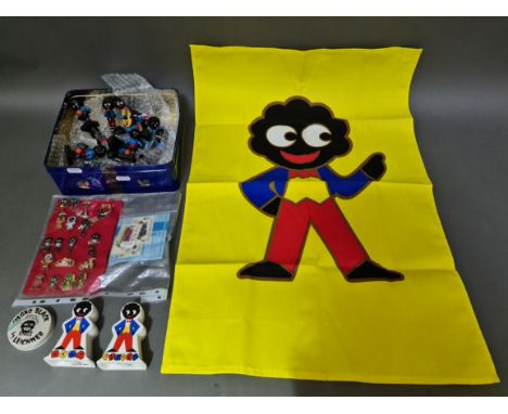 A collection of Robertson's golly items including 8 bandsmen, 10 footballers, a salt and pepper, a tea towel, 17 badges, one 